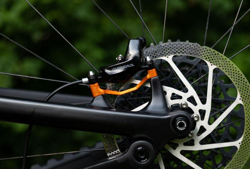 Oak Components Plasmadapt Brake Adapter, Post Mount, +20mm, Orange (incl. Titanium Mounting Hardware)