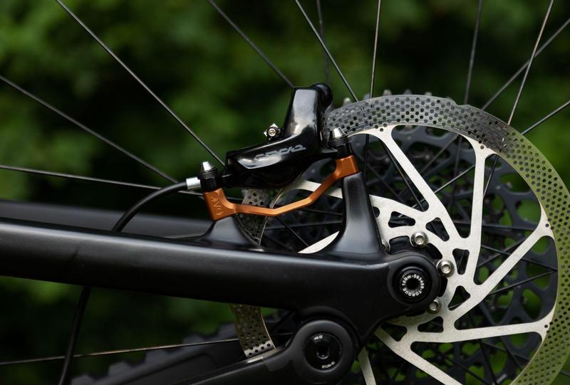 Oak Components Plasmadapt Brake Adapter, Post Mount, +20mm, Kash Gold (incl. Titanium Mounting Hardware)