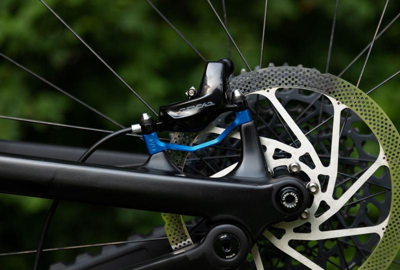 Oak Components Plasmadapt Brake Adapter, Post Mount, +20mm, Blue (incl. Titanium Mounting Hardware)