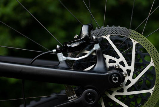 Oak Components Plasmadapt Brake Adapter, Post Mount, +23mm, Raw (incl. Titanium Mounting Hardware)